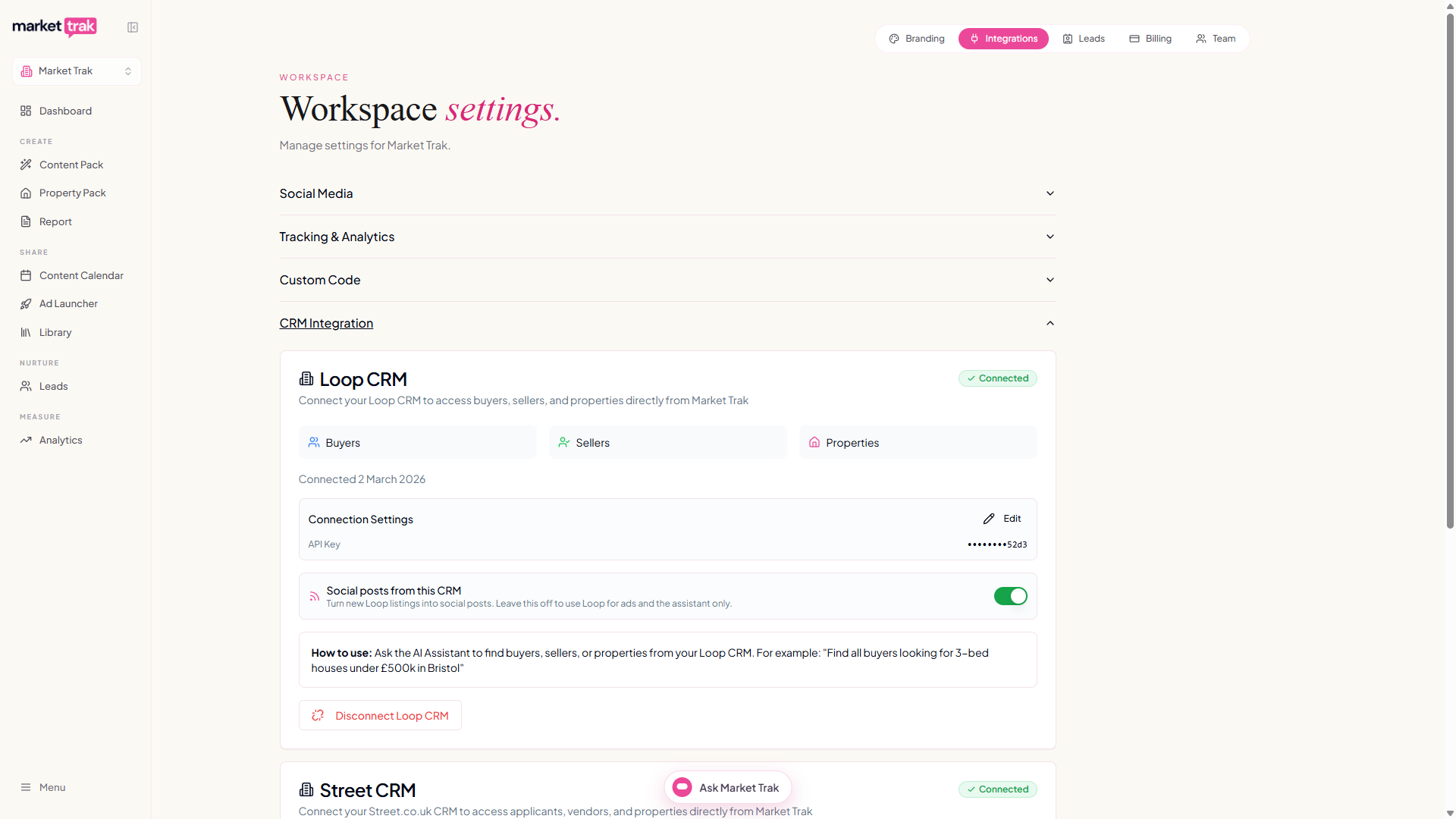 The CRM Integration section with Loop CRM connected, its masked API key and the social posts toggle